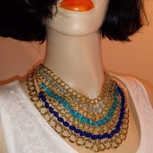 7 TIER SWOOP NECKLACE with MOLDED GLASS BEADS & GOLD TONE CHAIN